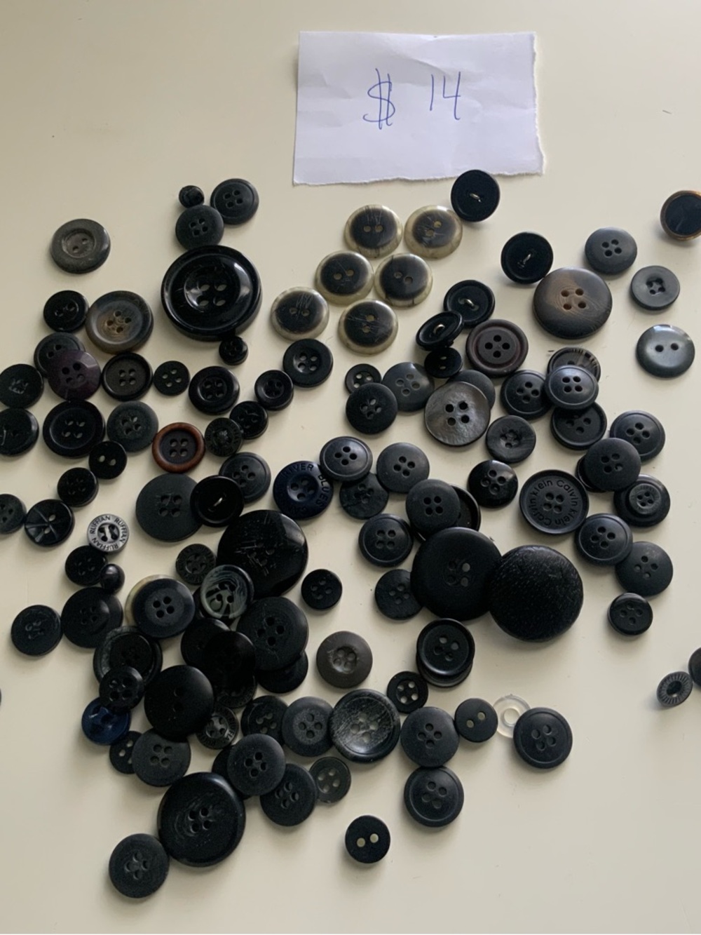 Mixed Assortment of Black and Gray Buttons